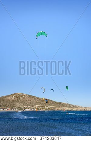 Kitesurfer In Big Jump In Air On Prasonisi Beach (rhodes, Greece)