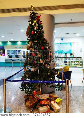 Beautiful View Of Christmas Tree Decoration With Bell, Gift Box And Star. Done At Entrance Of Columb