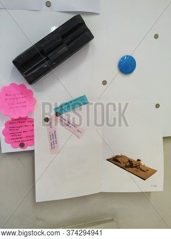 Closeup Of Office Atmosphere Like In Front Of Desk, Board, Duster, Sticky Notes And Pins For Pasting