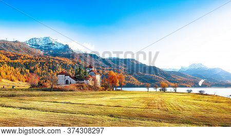 Fantastic Autumn View Of Crap Da Sass Castle On Silvaplana Lake. Location: Silvaplana, Maloya Distri