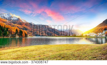 Stunning Autumn Panorama Of Silvaplana Lake And  Village At Sunset.  Mirror Reflaction In Lake. Loca