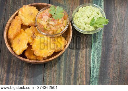 Patacón Fried Flattened Pieces Of Green Plantain (tostón, Tachino)