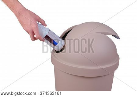 Hand Push A Trash Into Big Brown Trashcan Or Waste Bin On White Background.