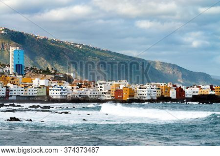 View On Ocean Shore And Colorful Buildings On The Rock In Punta Brava, Puerto De La Cruz, Tenerife, 