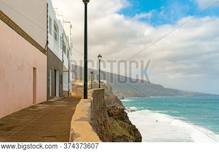 View On Colorful Buildings On The Rock Over The Ocean In Punta Brava, Puerto De La Cruz, Tenerife, C