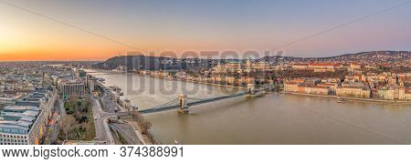Panoramic Aerial Drone Shot Of Chain Bridge Over Danube River Buda Castle Before Budapest Sunrise