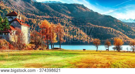 Fantastic Autumn View Of Crap Da Sass Castle On Silvaplana Lake. Location: Silvaplana, Maloya Distri