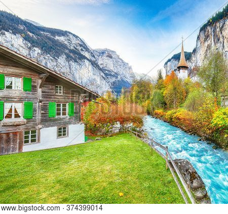Fantastic Autumn View Of Lauterbrunnen Village With Awesome Waterfall  Staubbach  And Swiss Alps In 