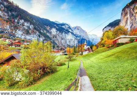 Captivating Autumn View Of Lauterbrunnen Valley With Gorgeous Staubbach Waterfall And Swiss Alps In 