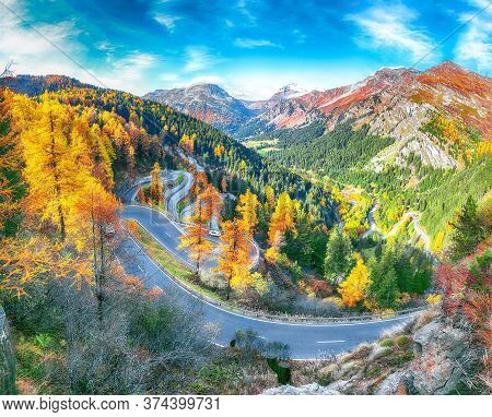 Stunning View Of Maloja Pass Road At Autumn Time. Colorful Autumn Scene Of Swiss Alps. Location: Mal