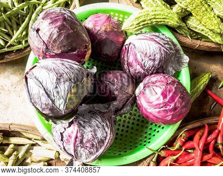 Close-up Heap, Pile Of Raw Cabbage On A Local Asia Farmers Market. Cooking And Healthy Food Concept,