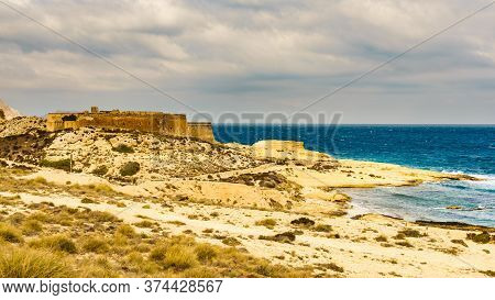 Castle San Ramon Above Beach Of El Playazo, Cabo De Gata Nijar, Province Almer
