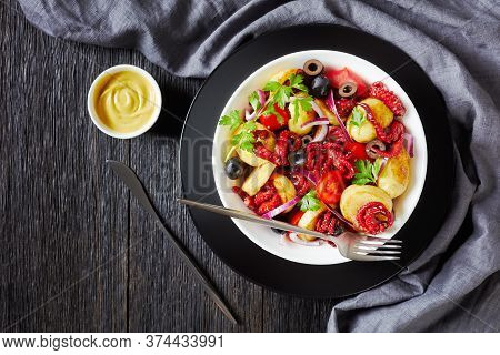 Seafood Salad Of Baby Octopuses With Boiled Young Potatoes, Olive Oil, Lemon, Cherry Tomatoes, Red O