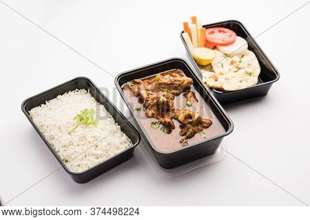 Mutton Masala Curry In Plastic Container For Home Delivery