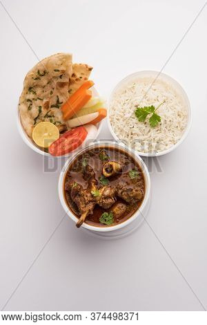 Mutton Masala Curry In Plastic Container For Home Delivery