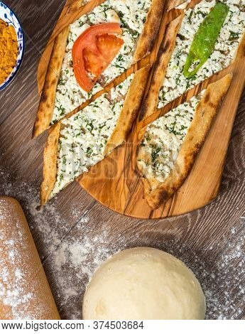 Traditional Turkish Baked Dish Pide. Turkish Pizza Pide, Middle Eastern Appetizers. Turkish Cuisine.