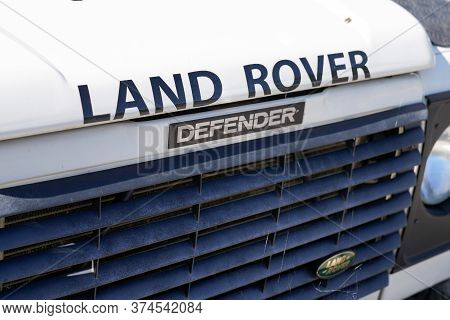 Bordeaux , Aquitaine / France - 06 14 2020 : Land Rover Defender Logo Car Sign Front Of Iconic Briti