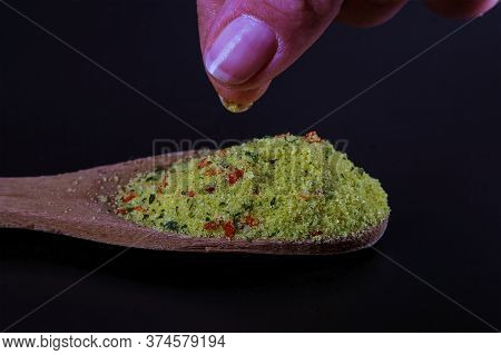 Universal Dry Bulk Seasoning For Dishes On A Black Background. Vegeta.