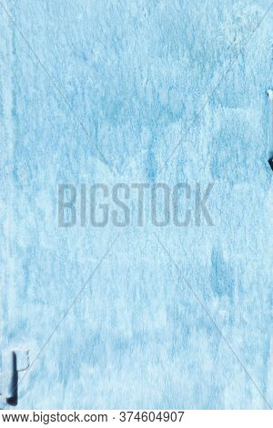 Blue Metal Door With Smudges Of Paint