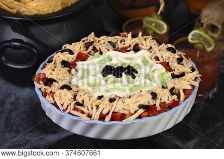 Spooky Halloween Seven Layer Taco Dip Turn A Classic Appetizer Into A Halloween Favorite With Just A