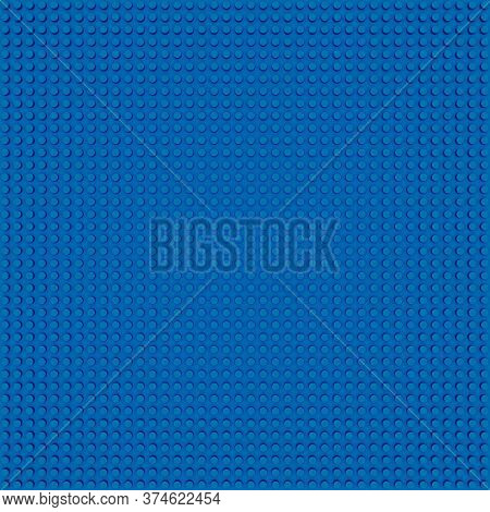 Blue Base Template Of Plastic Construction Brick. Plastic Toy Blocks Background In Blue. Constructio