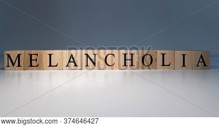 Text Of Melancholia From Wooden Cubes. Psychological Terms And Health Problems.