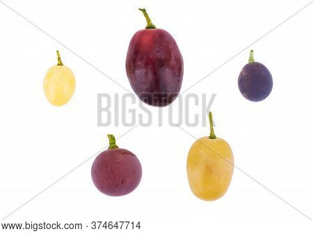 Green Grapes And Black Grapes Large Bunch Of Fresh Fruit With Green Leaves And White Backgrounds