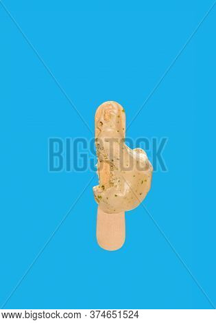 A Seaweed Flavor Popsicle With The Last Bit On Blue Background