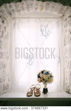 Bridal Bouquet Of White And Pink Roses, Babys Breathe, Scabiosa, Hortense And White Ribbons In A Bri