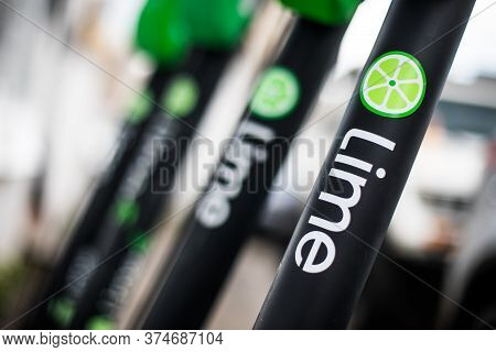 Bucarest, Romania - May 26. 20202: Image Of Some Lime-s E-scooters Parked On Sidewalk In Bucharest, 