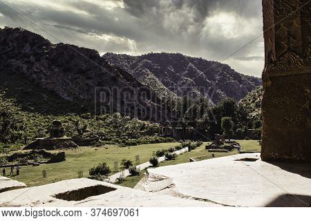 Rajasthan, India - October 06, 2012: A Landscape Of Hilly Mountains Surrounding Abandoned Cursed Rui