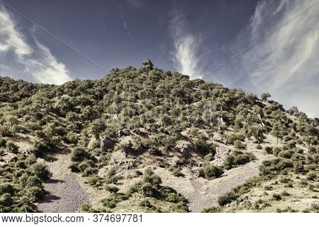 Rajasthan, India - October 06, 2012: A Landscape Of Hilly Mountains Surrounding Abandoned Cursed Rui