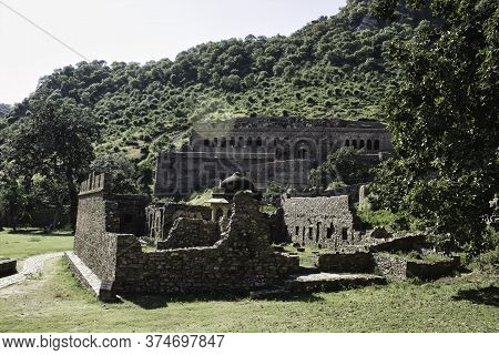 Rajasthan, India - October 06, 2012: A Landscape Of Hilly Mountains Surrounding Abandoned Cursed Rui