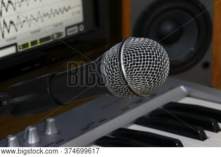 Home Recording Studio. Screen Keyboard, Speakers And Microphone.