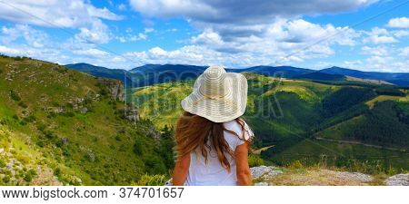 woman looking at beautiful landscape- Cevennes, Lozere, Gorges de la Jonte,Causse Mejean