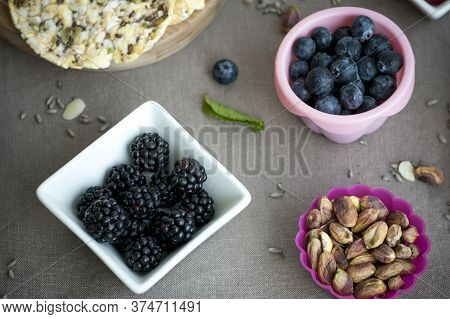 Healthy Breakfast Scene With Nuts And Berries