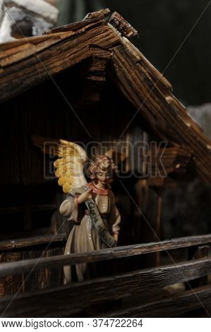 Angel Figure With 'gloria In Excelsis' Sash