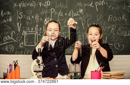 Basic Knowledge Of Chemistry. Girls Study Chemistry. Make Studying Chemistry Interesting. Microscope