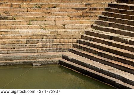 Horizontal And Diagonal Pattern Of Stone Steps At Pond In Melukote, Mandya District, Karnataka, Indi