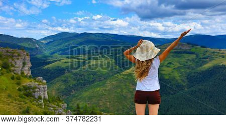 woman enjoying beautiful landscape- Cevennes, Lozere, Gorges de la Jonte,Causse Mejean