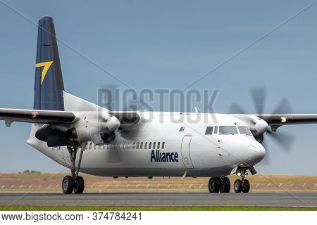 Avalon, Australia - February 28, 2015: Alliance Airlines Fokker 50 Regional Airliner Aircraft Taxiin
