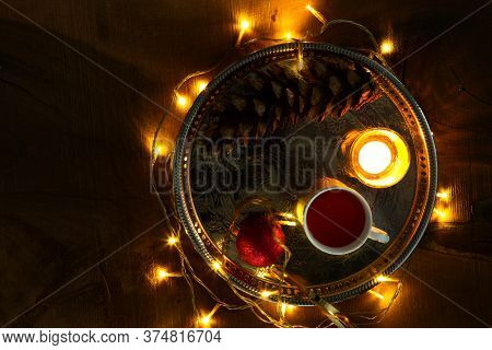 Christmas Theme With Candles, Snow, Pine Cone And Christmas Light