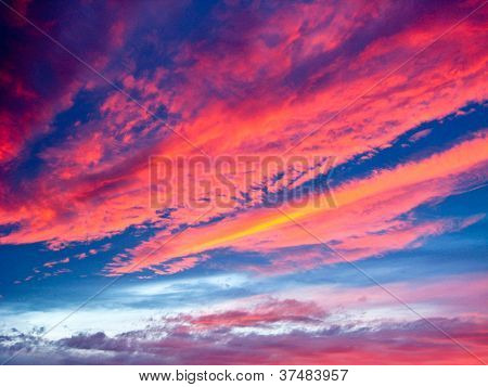 Evening landscape with beautiful picturesque clouds