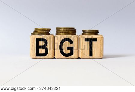 Cubes With The Word Bgt On Them. Care Concept.