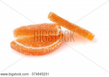 Composition Of Marmalade Candy In Shape Of Citrus Fruits Wedges. Yellow And Orange Jelly Sweet Candi