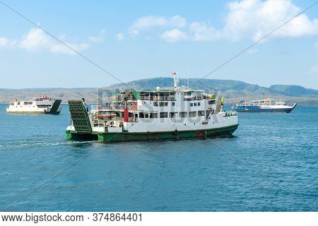 Group Of Bali Public Ferry Ship Carrying Passengers From Gilimanuk Harbour Ferry Port In Bali Island