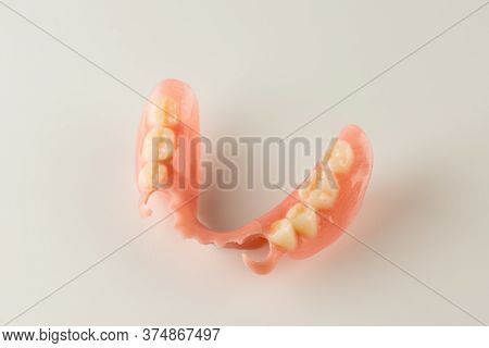Large Image Of A Modern Denture On A White Background