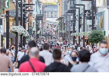Andorra La Vella, Andorra : 2020 July 06 : People Walk In The Comercial Street Named Meritxell After
