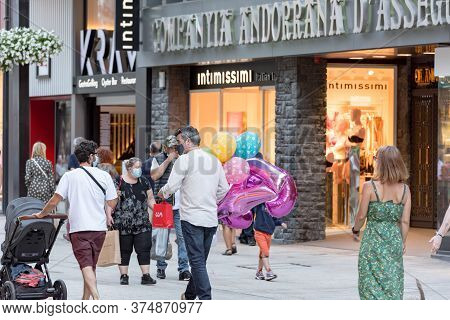 Andorra La Vella, Andorra : 2020 July 06 : People Walk In The Comercial Street Named Meritxell After