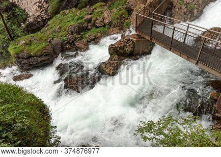 Bridge Over The River From The Gollinger Waterfall. Austria